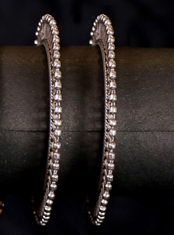 SILVER BANGELS